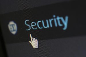 Cyber Essentials blog cover- a button labelled "Security"